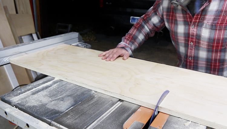cutting plywood on table saw