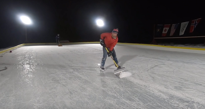 shoveling an outdoor hockey rink