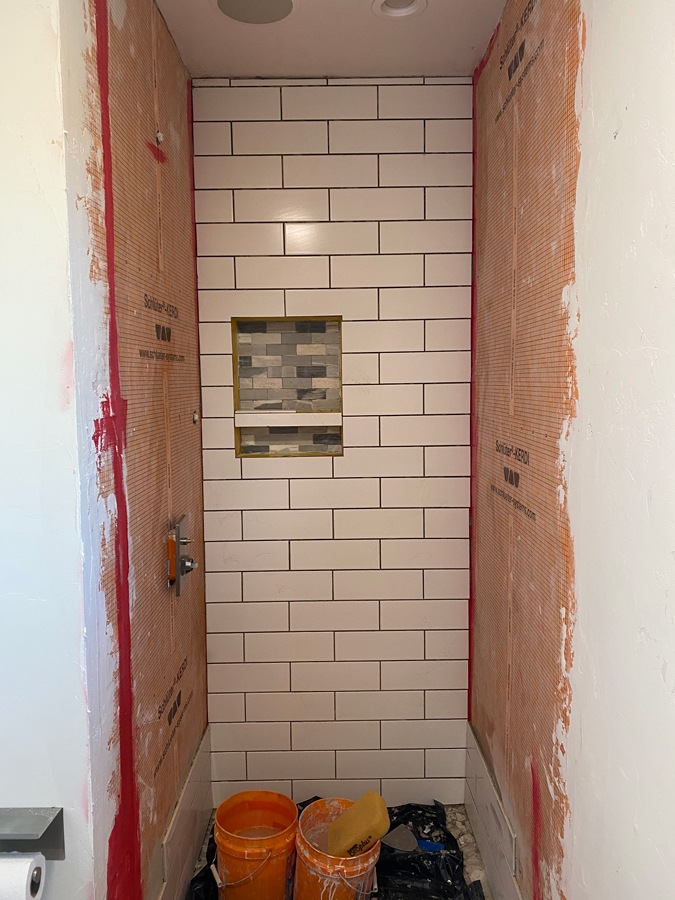 white subway tile in bathroom
